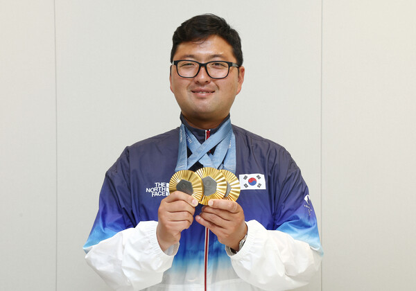 양궁 3관왕을 달성한 김우진 선수 /연합뉴스